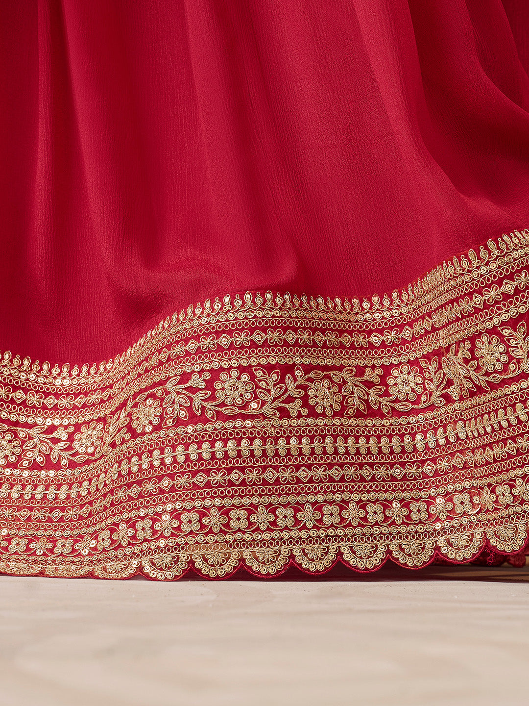 Traditional red sharara outfit with scalloped sequin dupatta