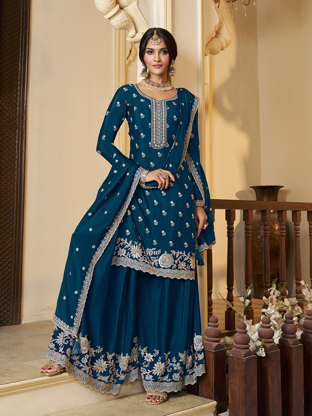 Teal blue sharara suit with white thread and sequin embroidery
