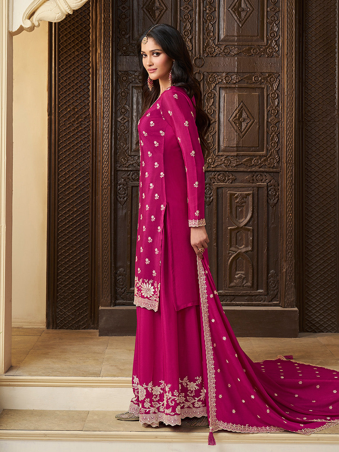 Rani pink ethnic outfit for weddings and sangeet