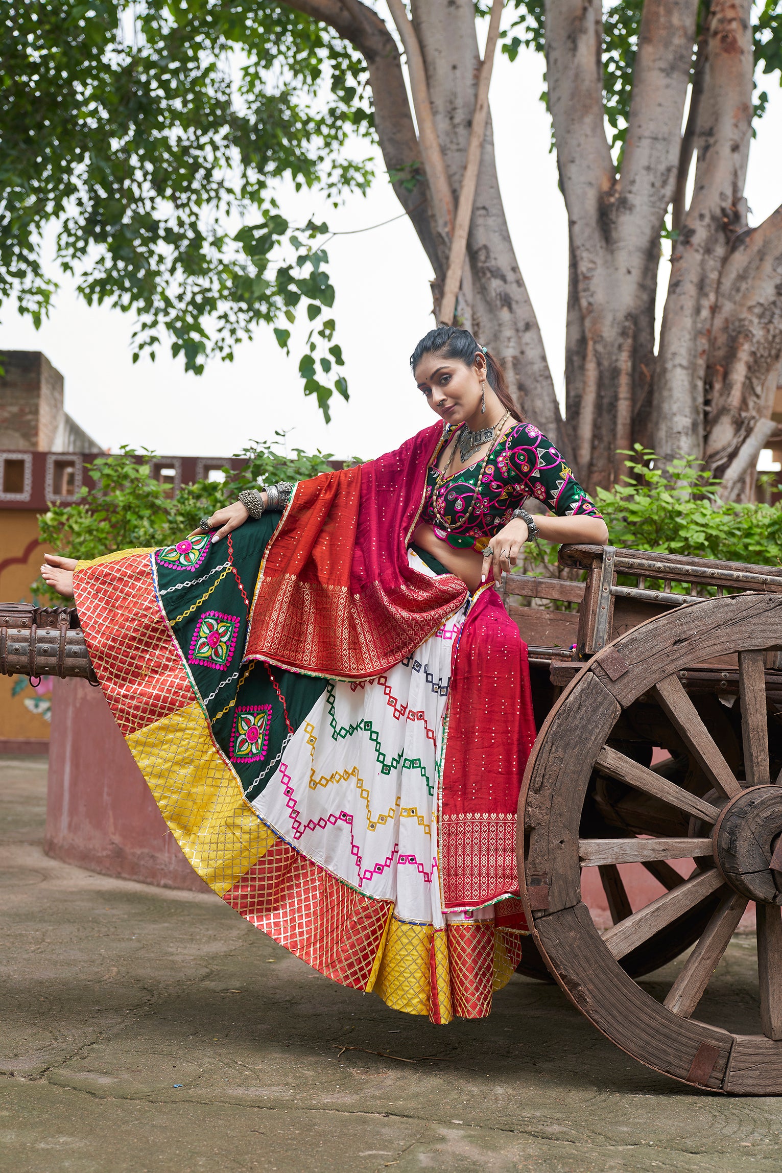 Mirror work blouse with multicolor lehenga