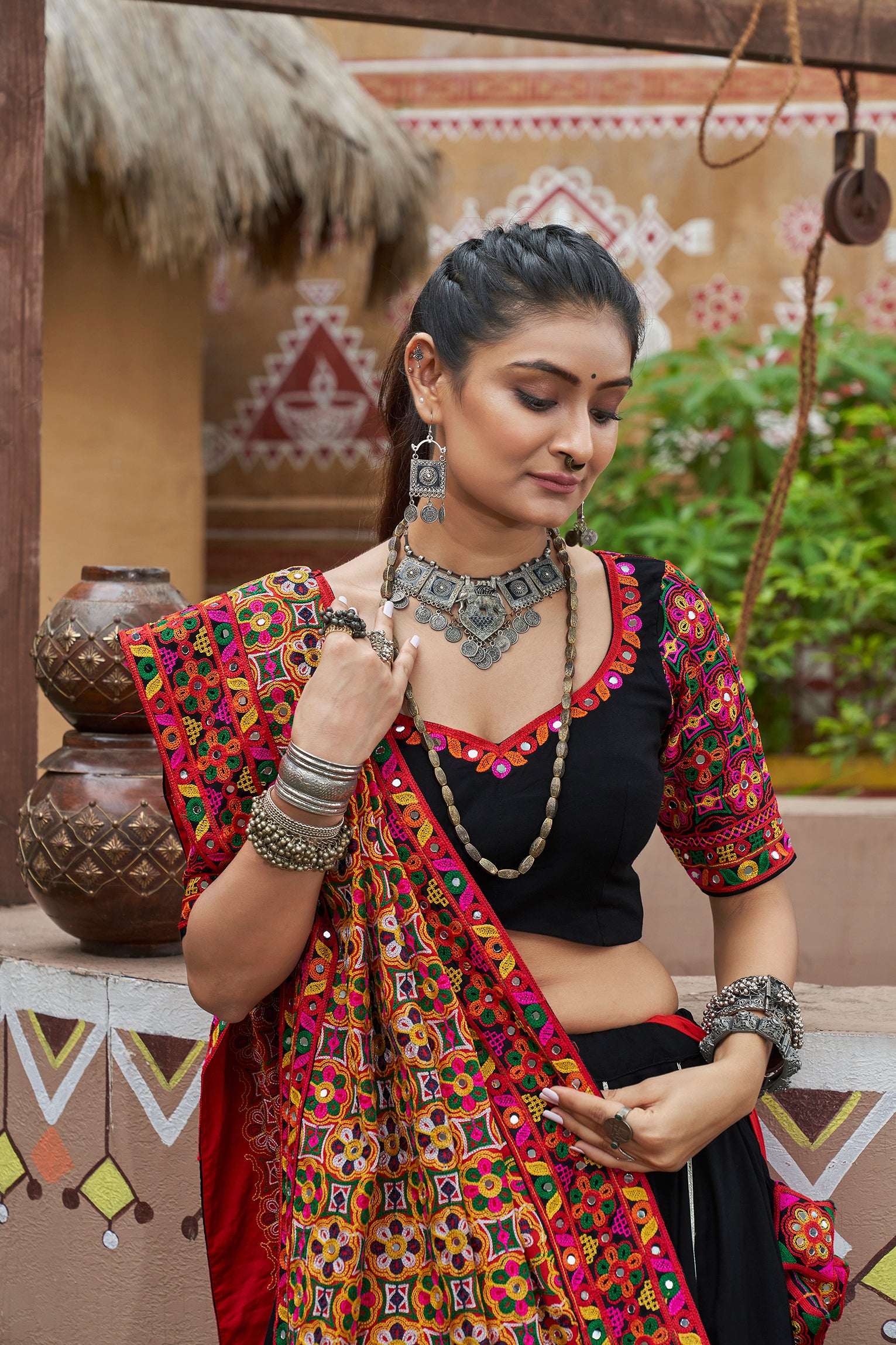 Navratri chaniya choli in black with mirror work