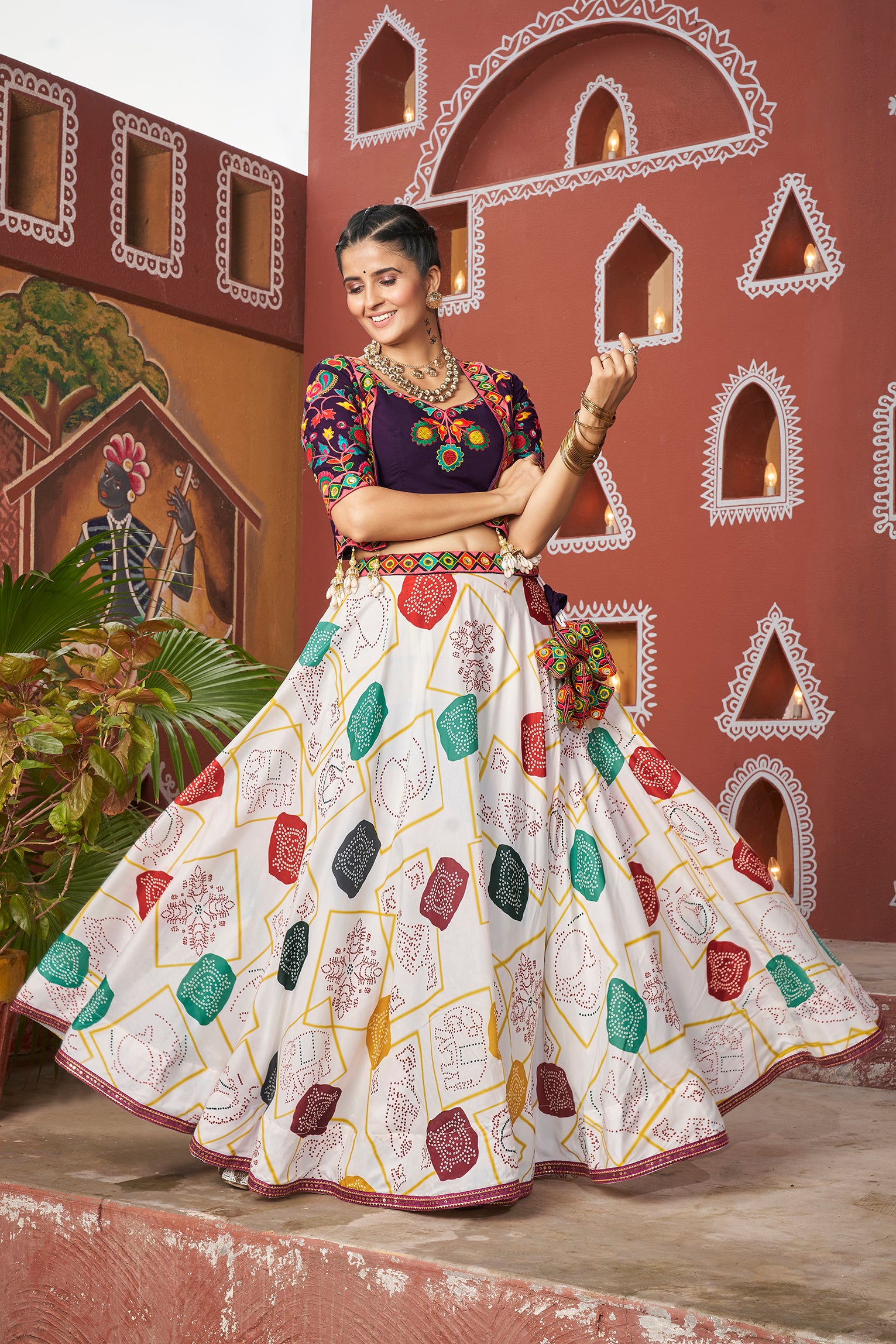 Back view of white lehenga with colorful prints – Garba outfit