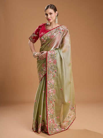 Olive green Jimmy Choo saree with red blouse