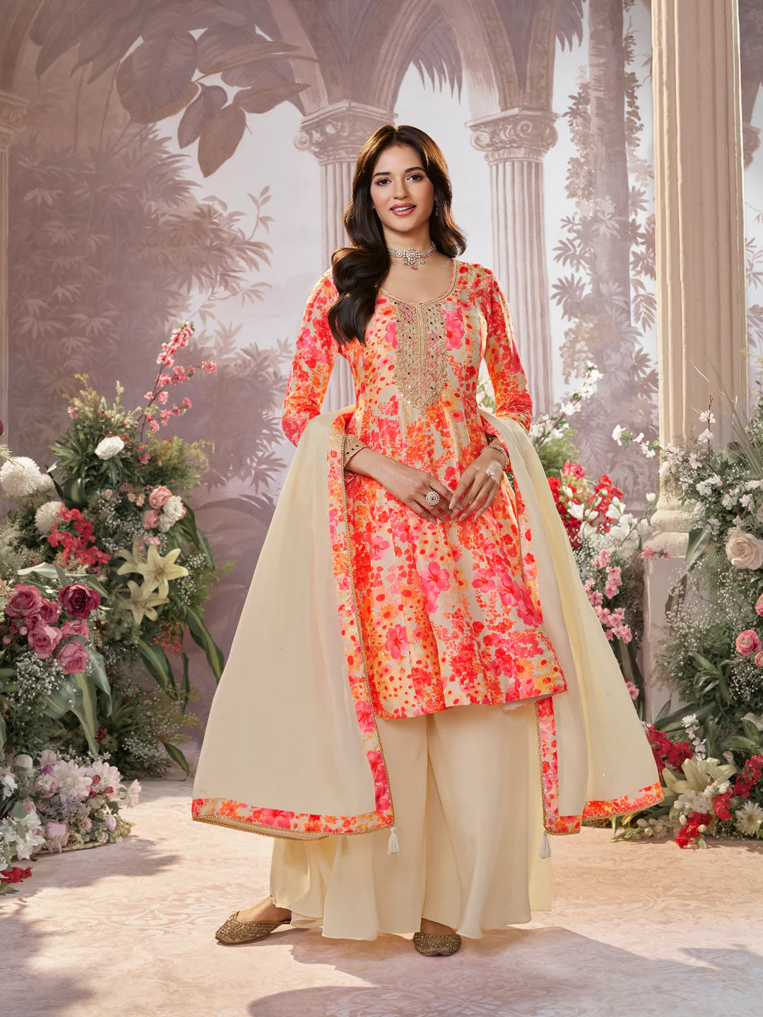 Festive cream sharara suit with floral printed kurta and tassel dupatta