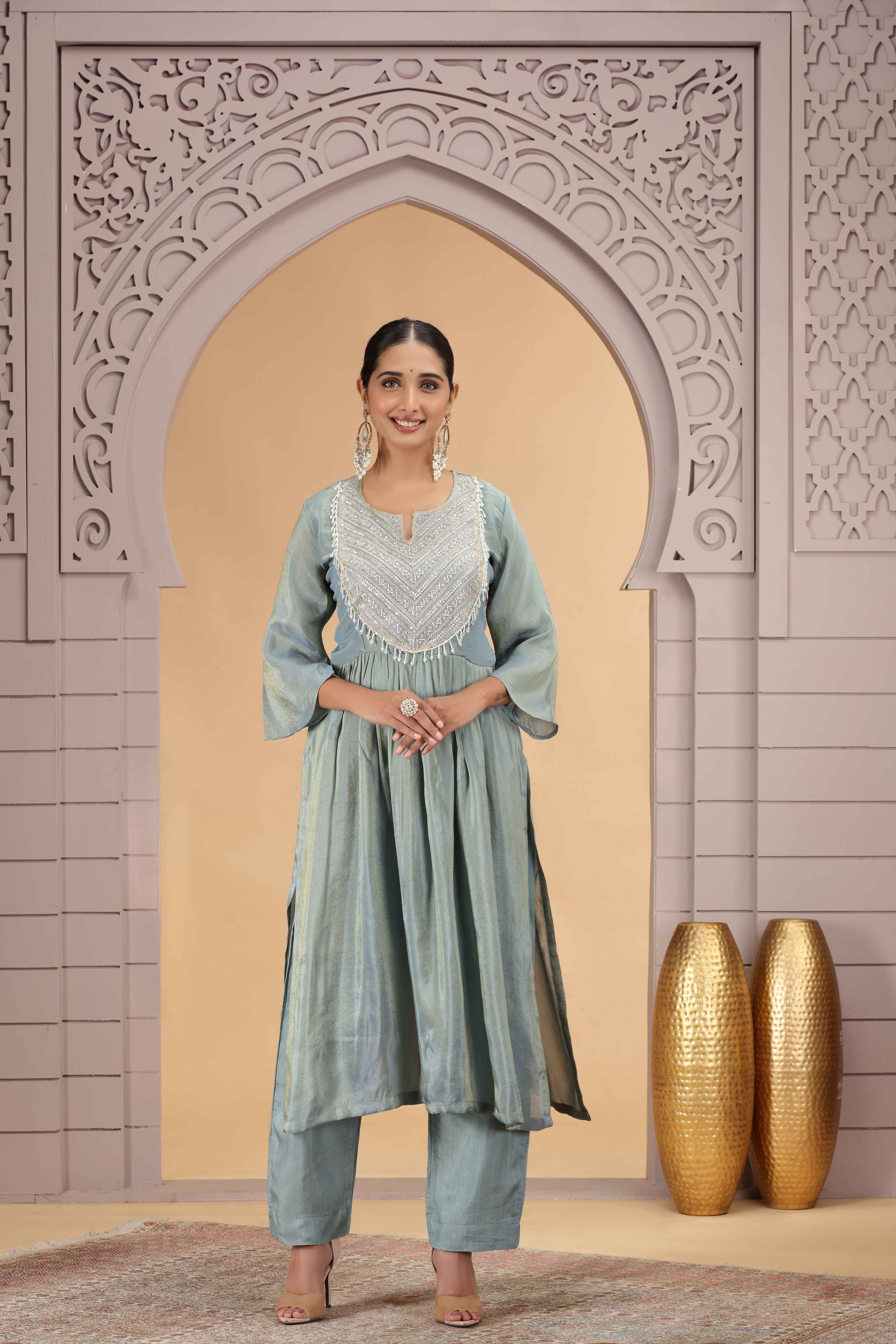 Firozi Shimmer Organza Pleated A-Line Kurta Pant Set Kurta Set Anant Tex Exports Pvt.Ltd..