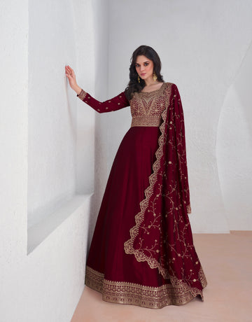 Red embroidered premium silk Anarkali suit with dupatta for weddings and festivals.