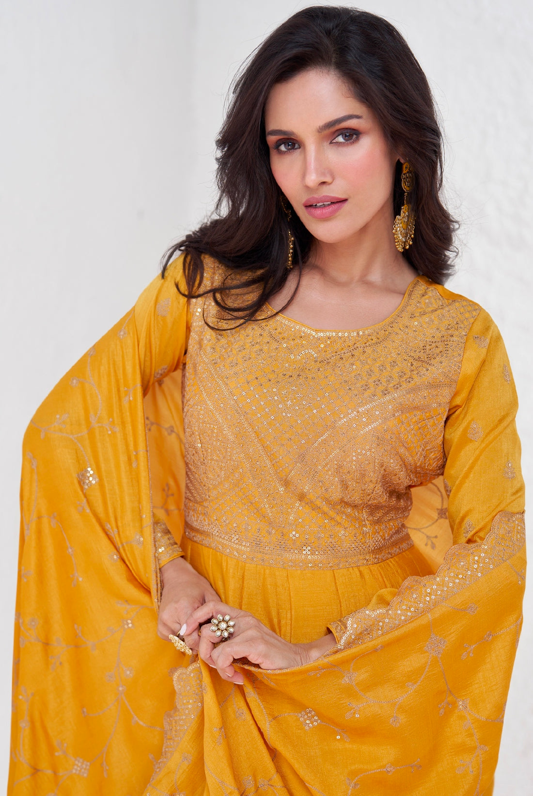 Mustard yellow embroidered premium silk Anarkali suit with dupatta for weddings and festivals.