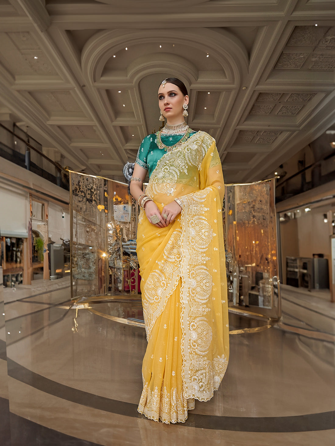 Yellow Fancy Tissue Saree with White Embroidery