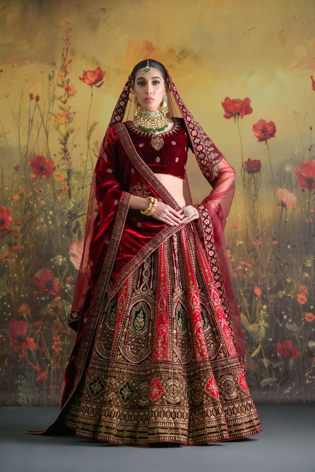 Maroon and Gold Velvet Bridal Lehenga with intricate hand embroidery and matching dupatta