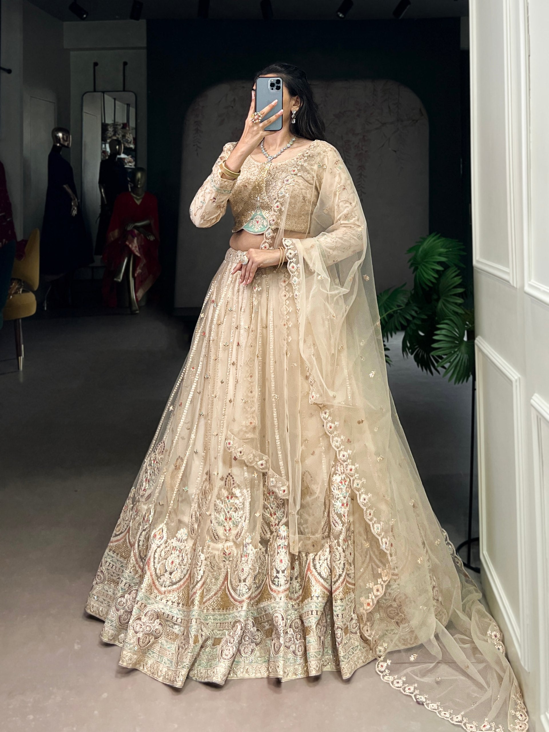 Cream Pure Net Silk Heavy Sequin Embroidery Net Lehenga Choli Net Lehenga Choli Anant Tex Exports Pvt.Ltd..