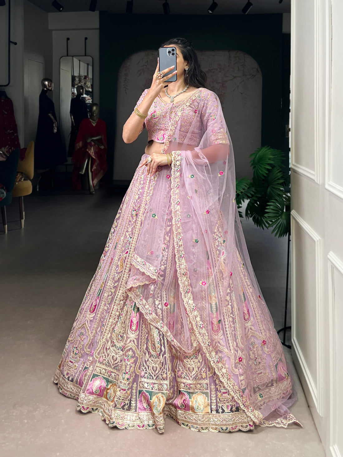 Lavender Pure Net Silk Heavy Sequin Embroidery Net Lehenga Choli