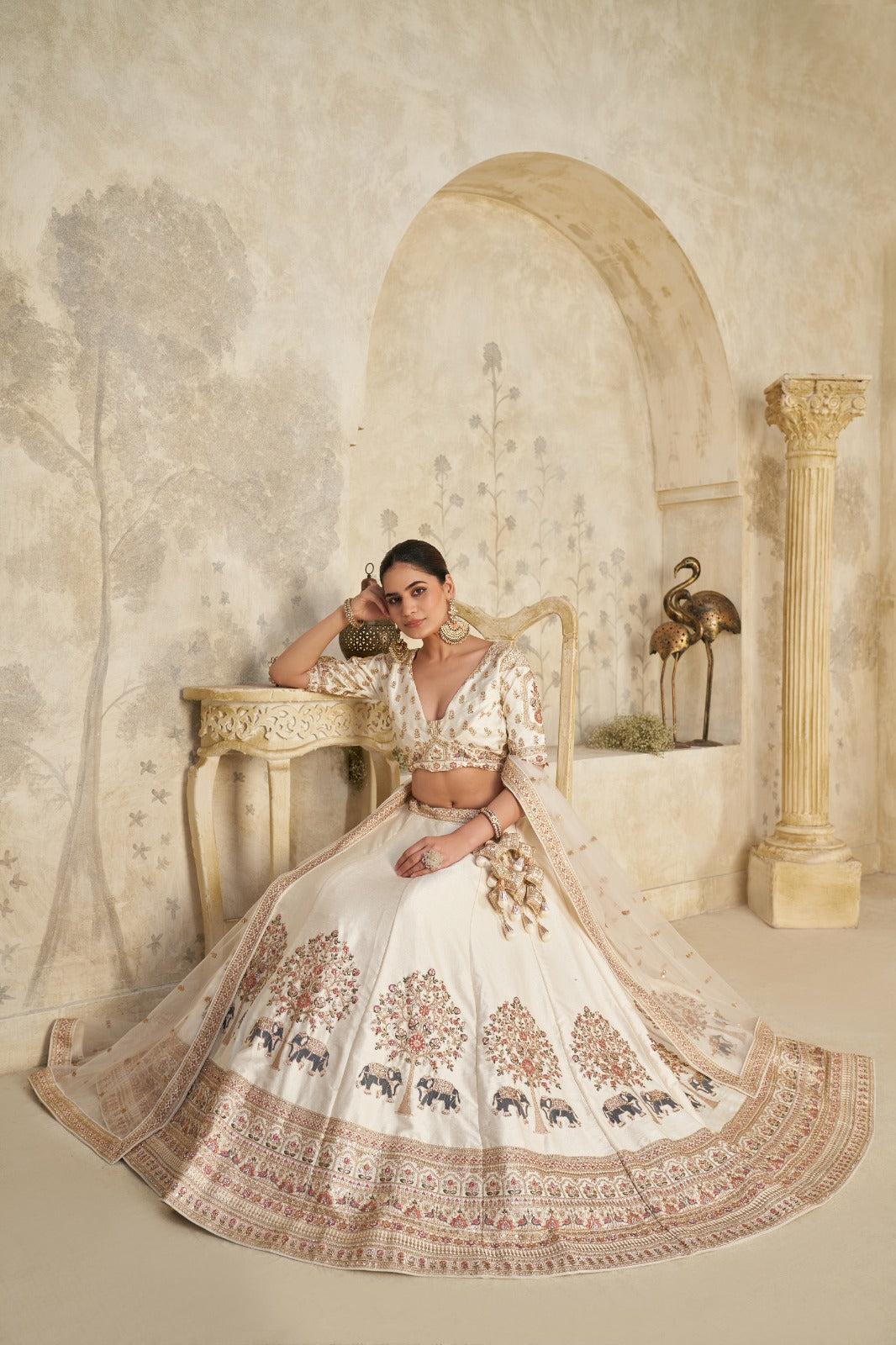 Ivory Royal Silk Lehenga with Elephant Zari Embroidery Silk lehenga Anant Tex Exports Pvt.Ltd..