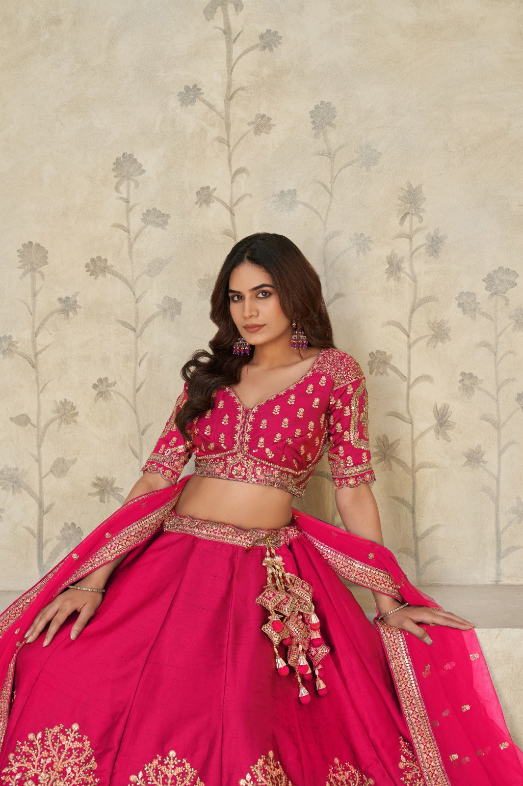 Rani Pink Silk Lehenga with Golden Elephant Embroidery Silk lehenga Anant Tex Exports Pvt.Ltd..
