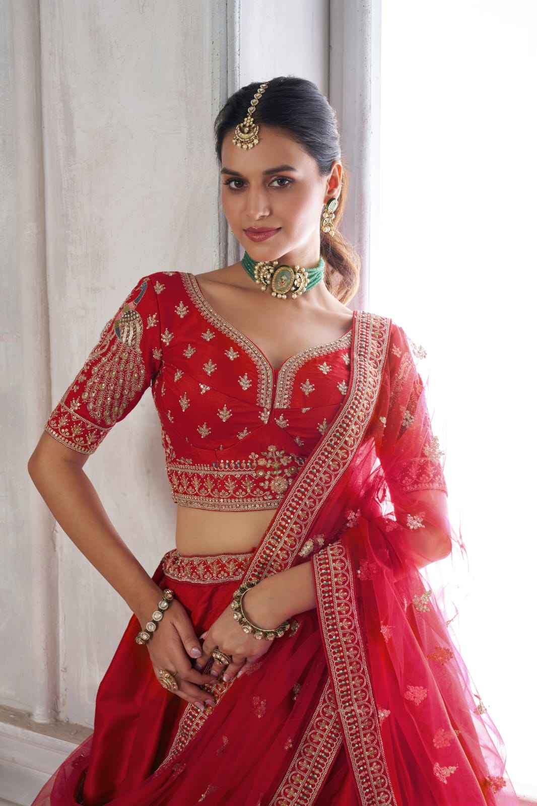 Red Silk Lehenga Choli with Peacock Zari Embroidery & Net Dupatta