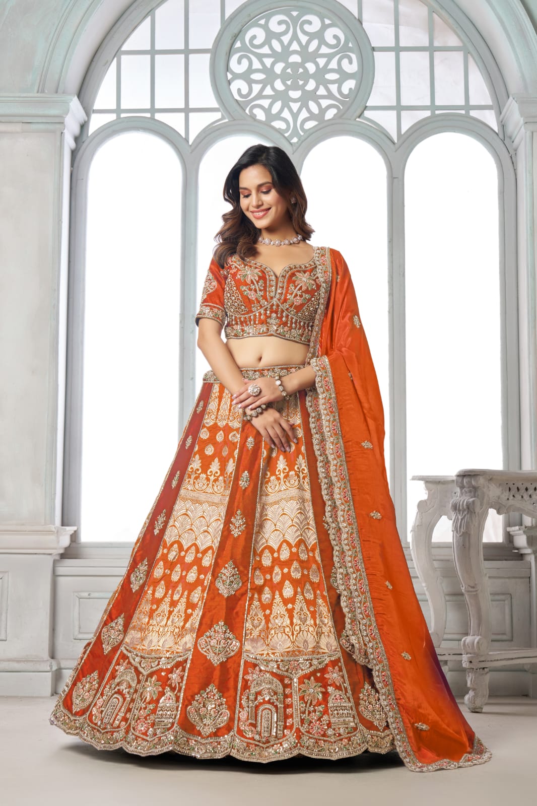 Orange Silk Lehenga Choli with Heavy Embroidery