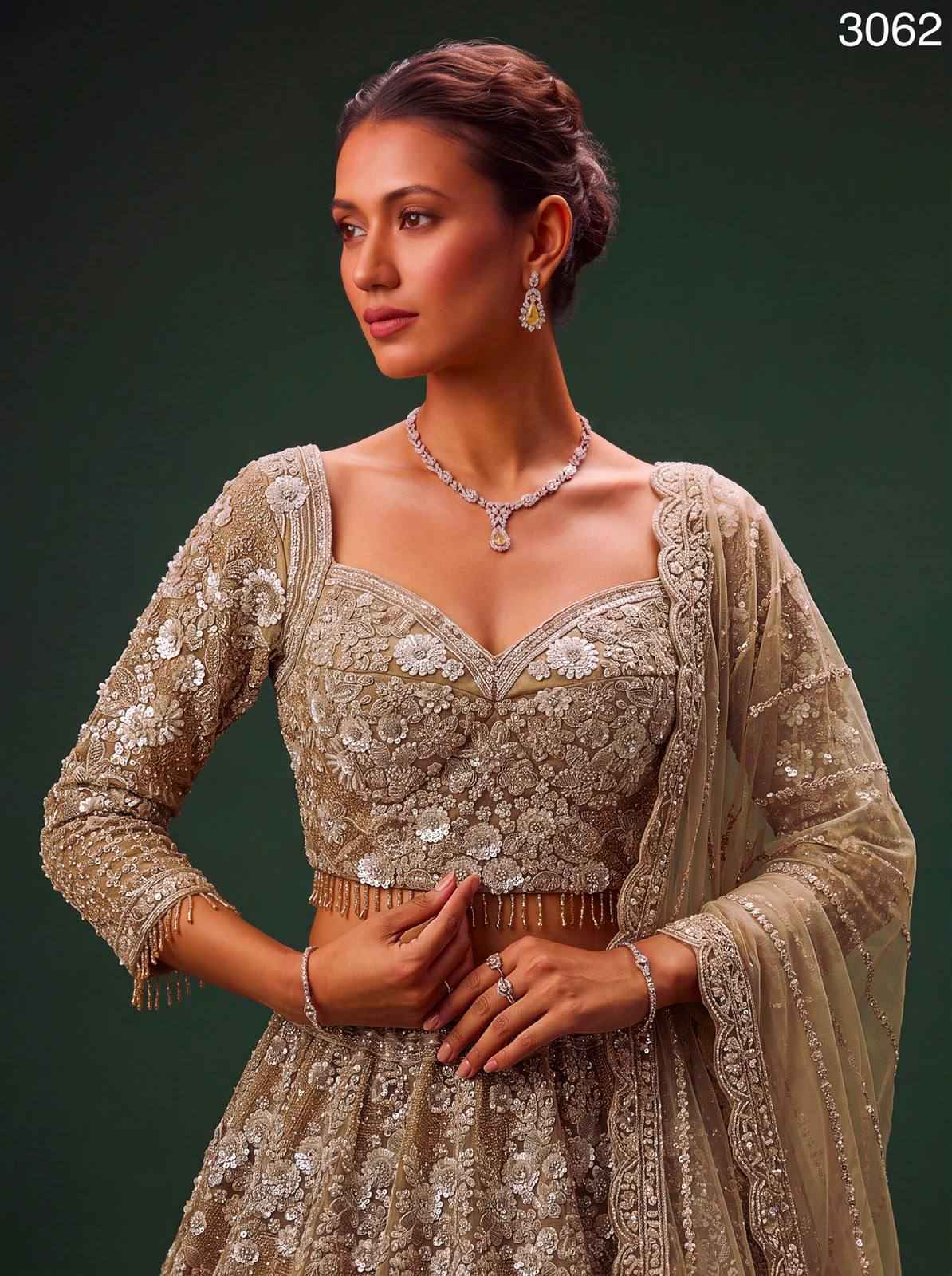 Golden Pure Heavy Net Monochrome Sequins Zari Embroidery Work Net Bridal Lehenga Choli
