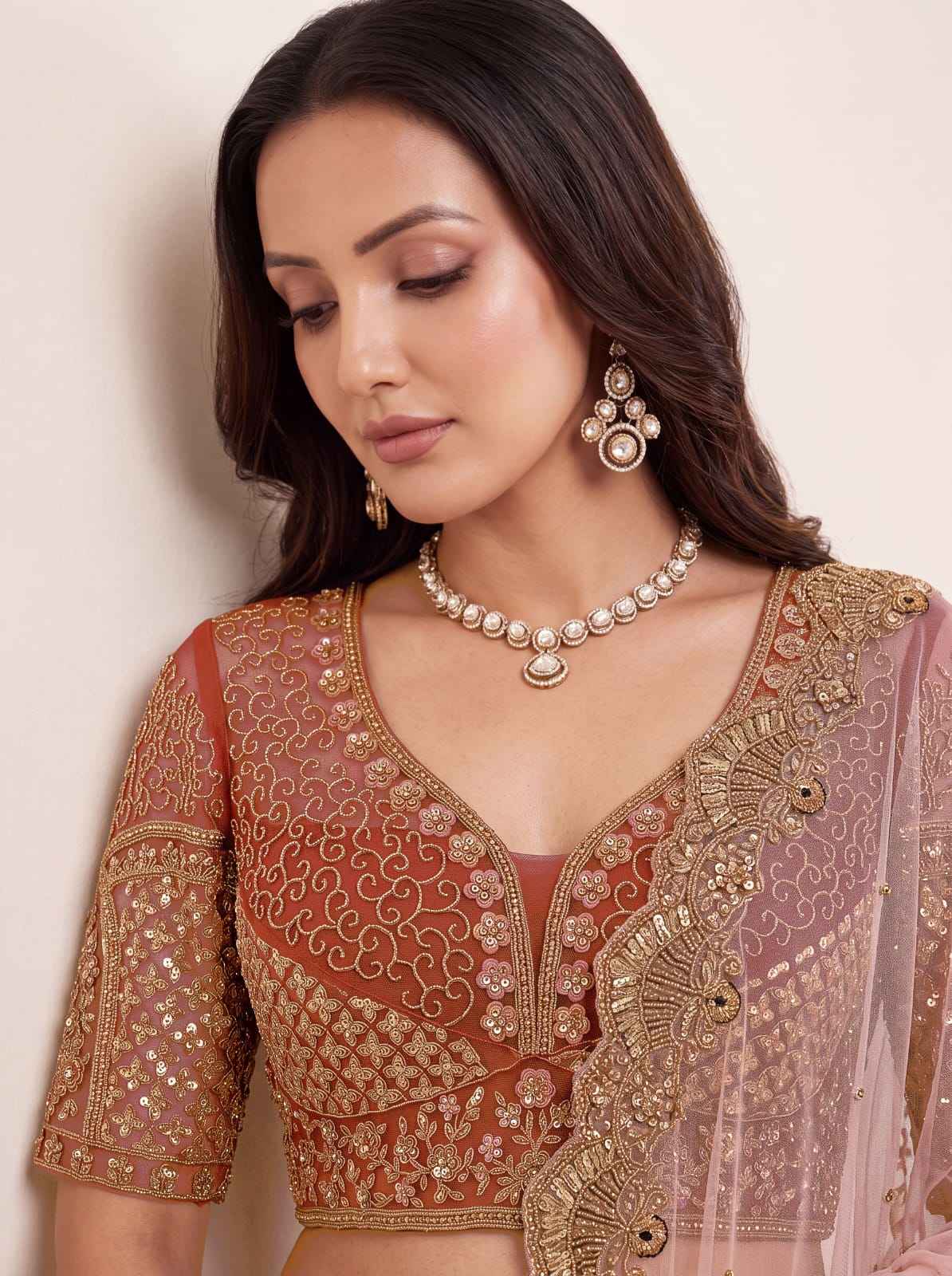 Peach Pure Heavy Net Peacock Pattern Multi Thread Sequins Work Net Bridal Lehenga Choli