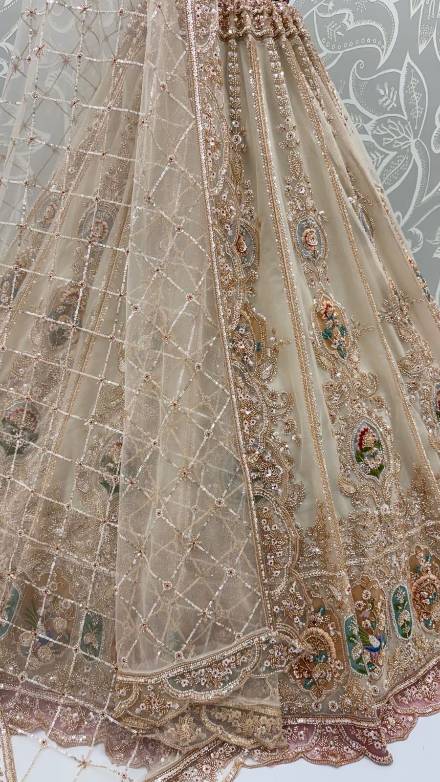 Cream Pure Heavy Net Motif Handwork Zari Sequins Work Bridal Lehenga Choli