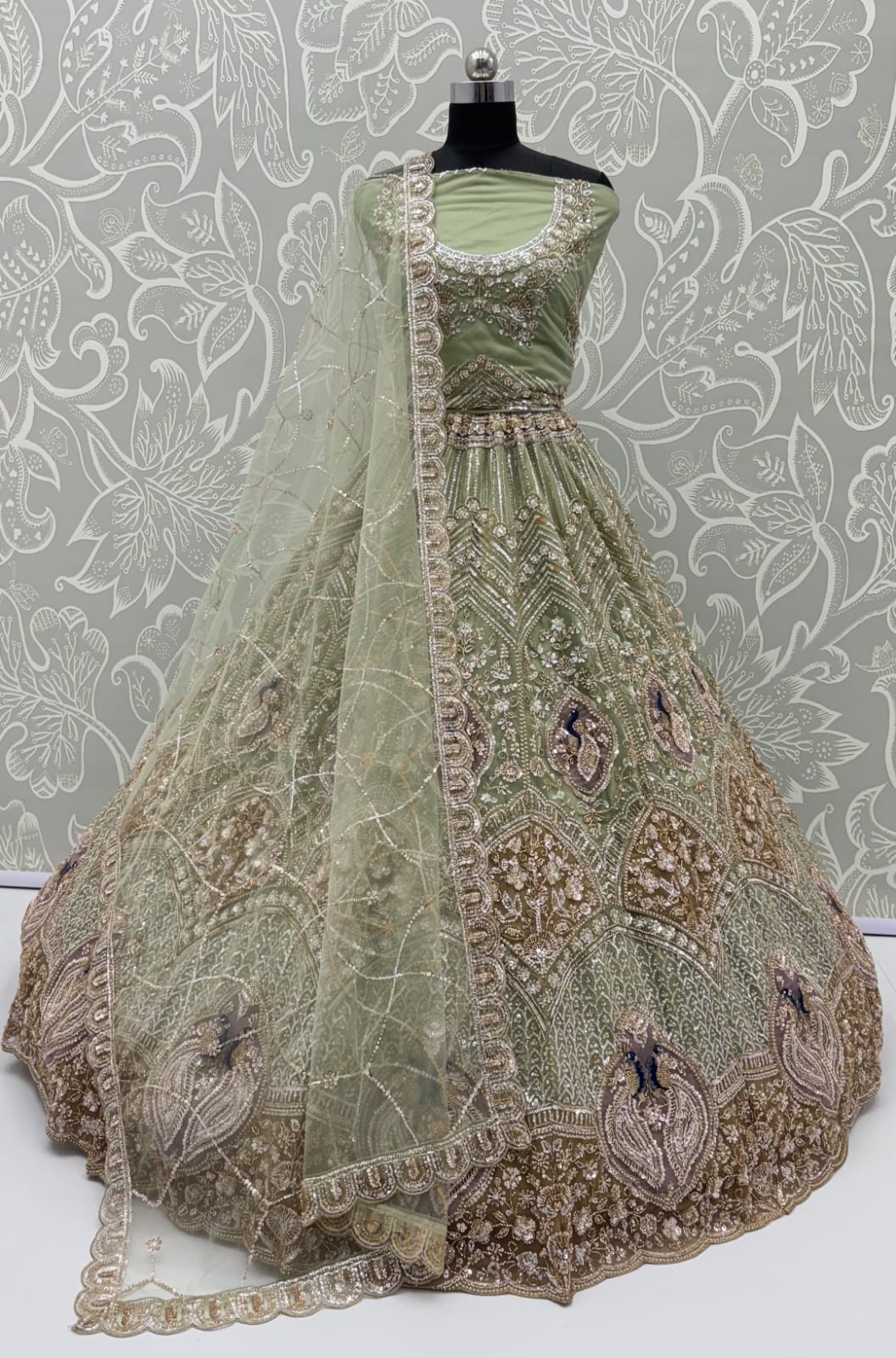 Pista Pure Heavy Net Motif Handwork Zari Sequins Work Bridal Lehenga Choli