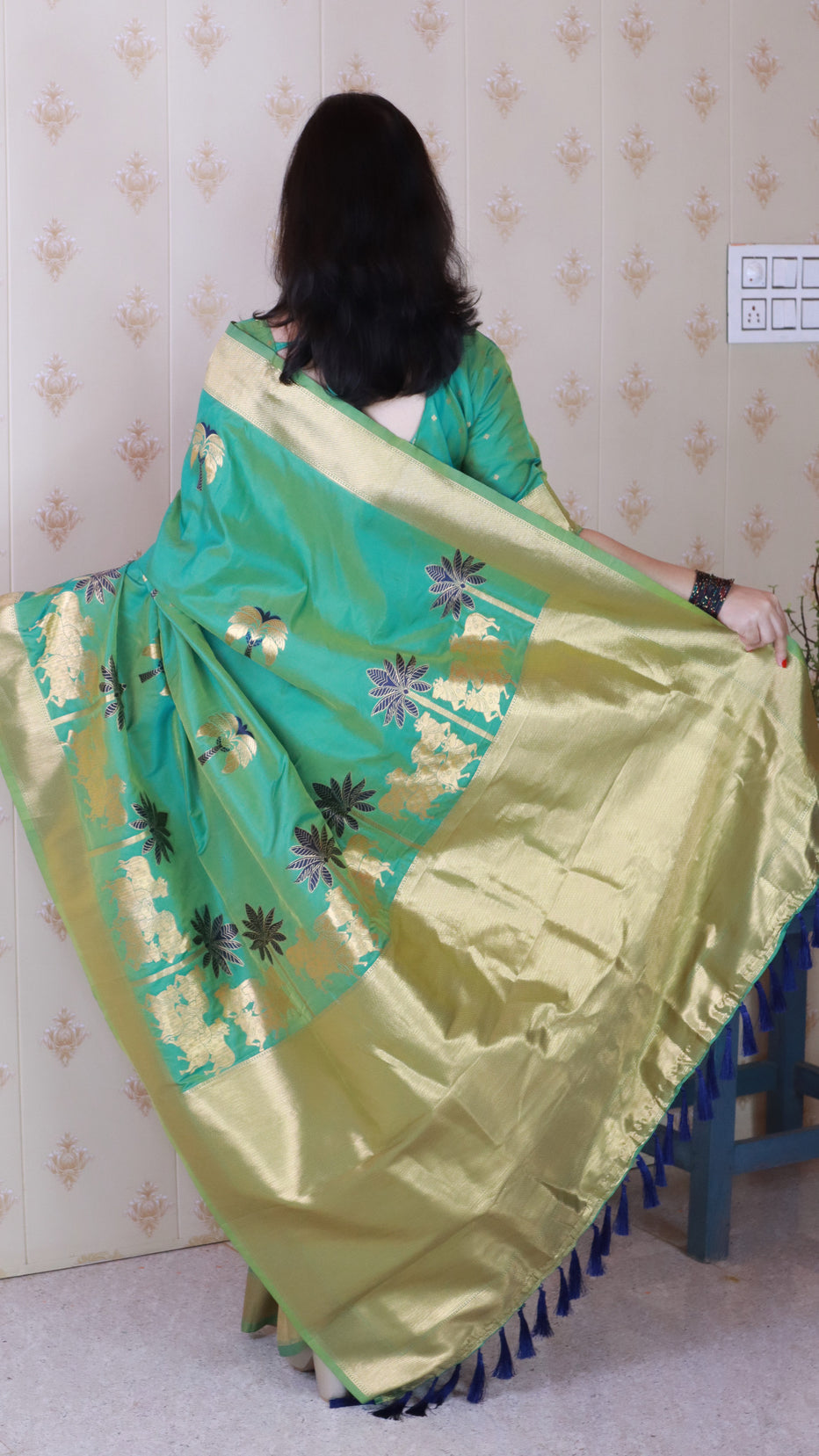 Green Soft Silk with Kamdhenu Weaves Zari Woven Saree