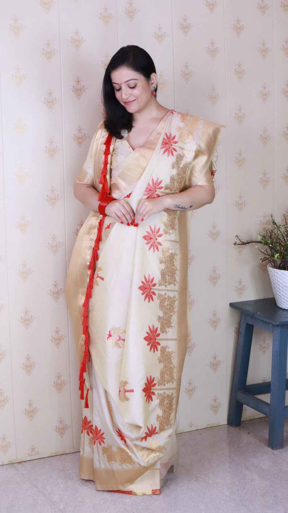 Cream Soft Silk with Kamdhenu Weaves Zari Woven Saree