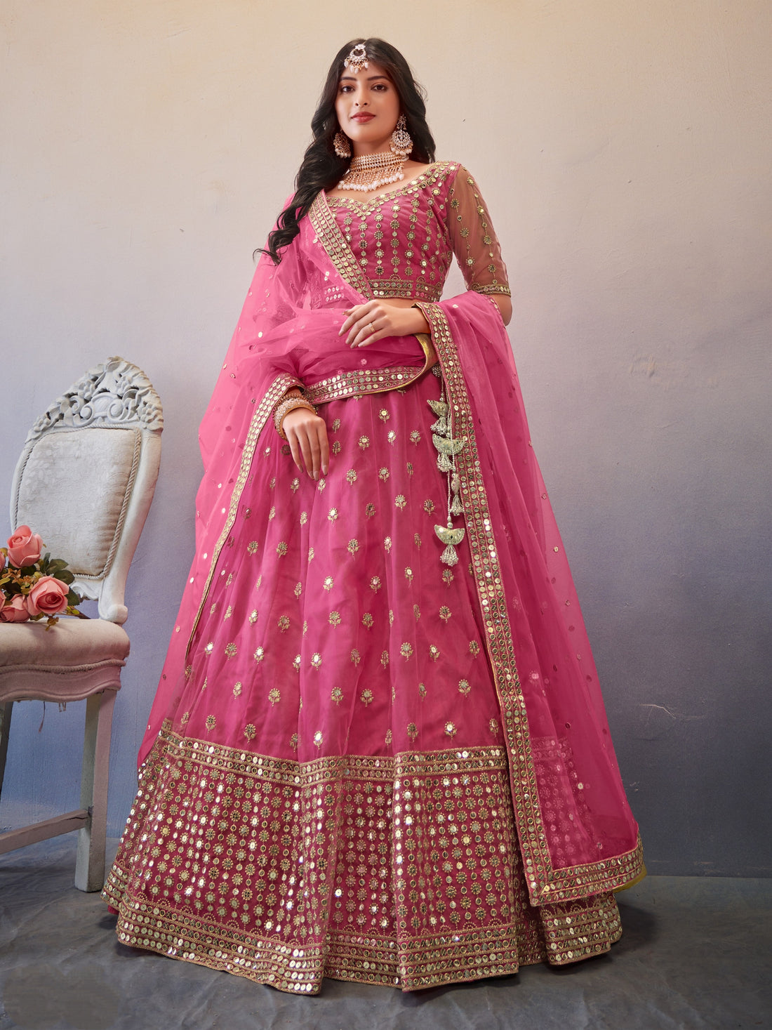 Dark Pink Heavy Embroidered Bridal Lehenga Choli with intricate detailing and matching dupatta