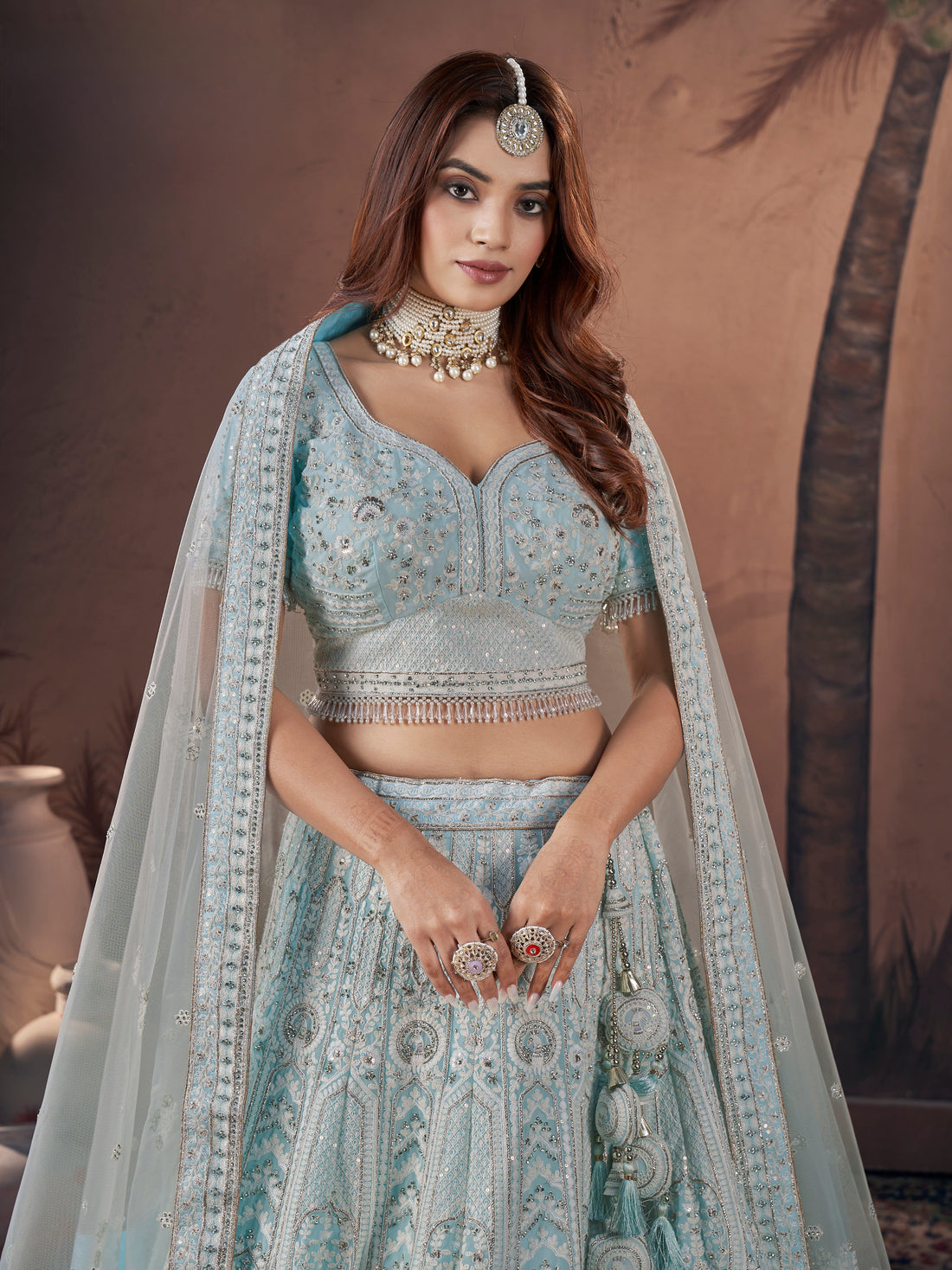 Ice blue bridal lehenga with full zarkan handwork and net dupatta