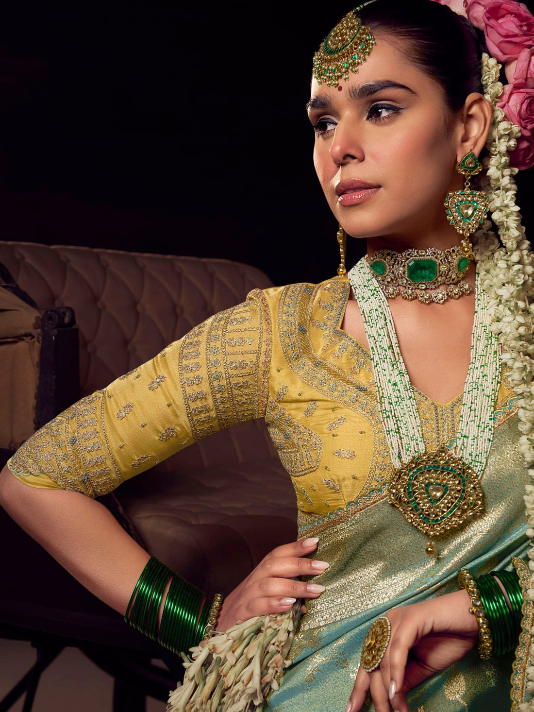 Mint green Banarasi saree with mustard heavy embroidered designer blouse