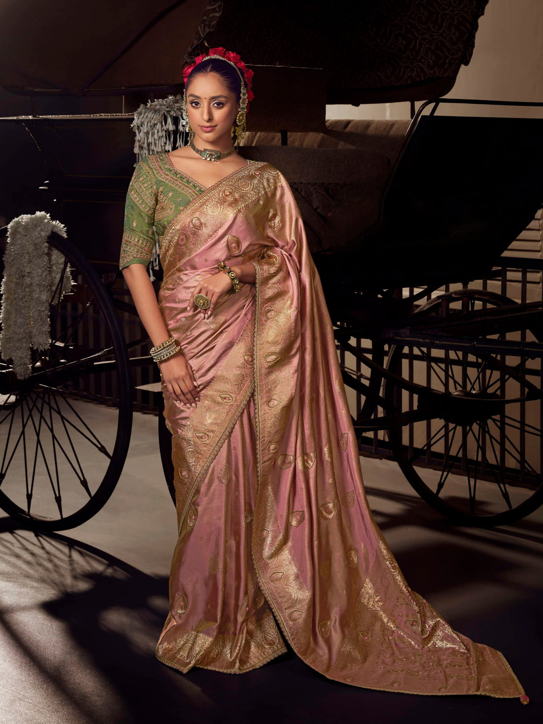 Dusty pink Banarasi saree with green contrast embroidered heavy blouse