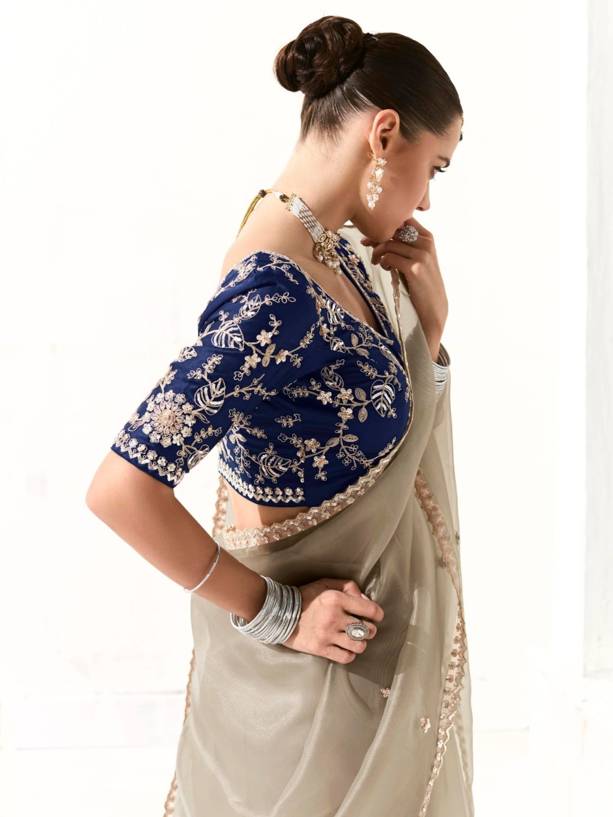 Elegant Grey Tissue Saree Featuring Butta Work and Fancy Designer Tassels