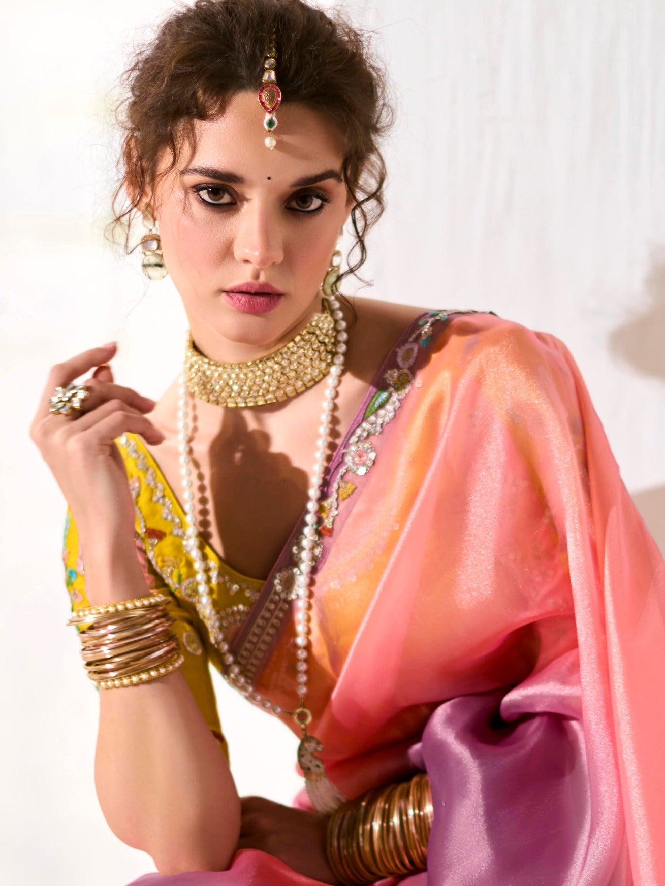 Elegant Ombre Orange Tissue Saree Featuring Butta Work and Fancy Designer Tassels