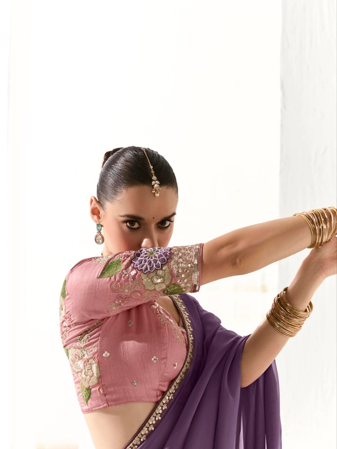 Elegant Purple Tissue Saree Featuring Butta Work and Fancy Designer Tassels