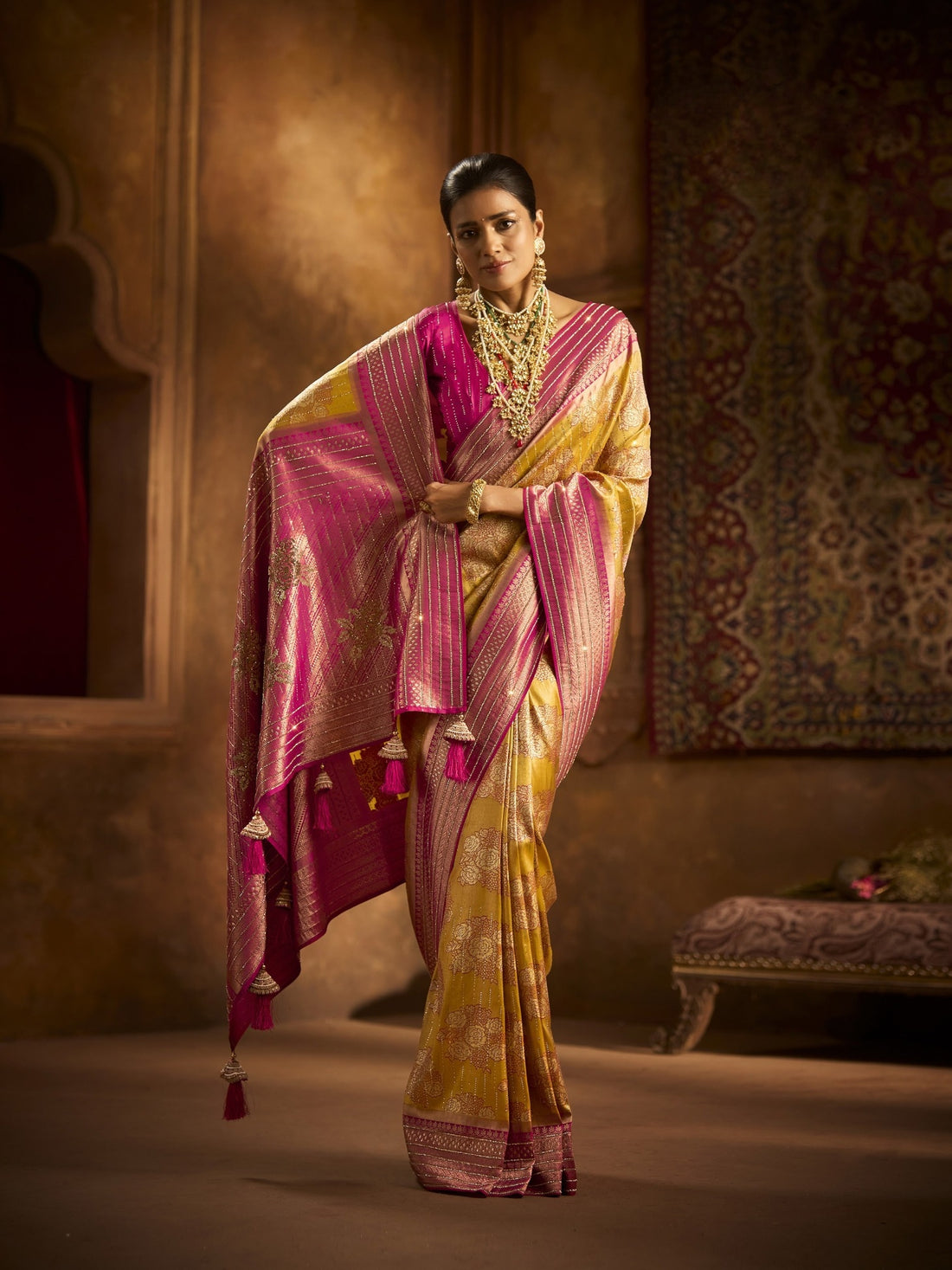 Mustard yellow Kanjivaram saree with pink pallu