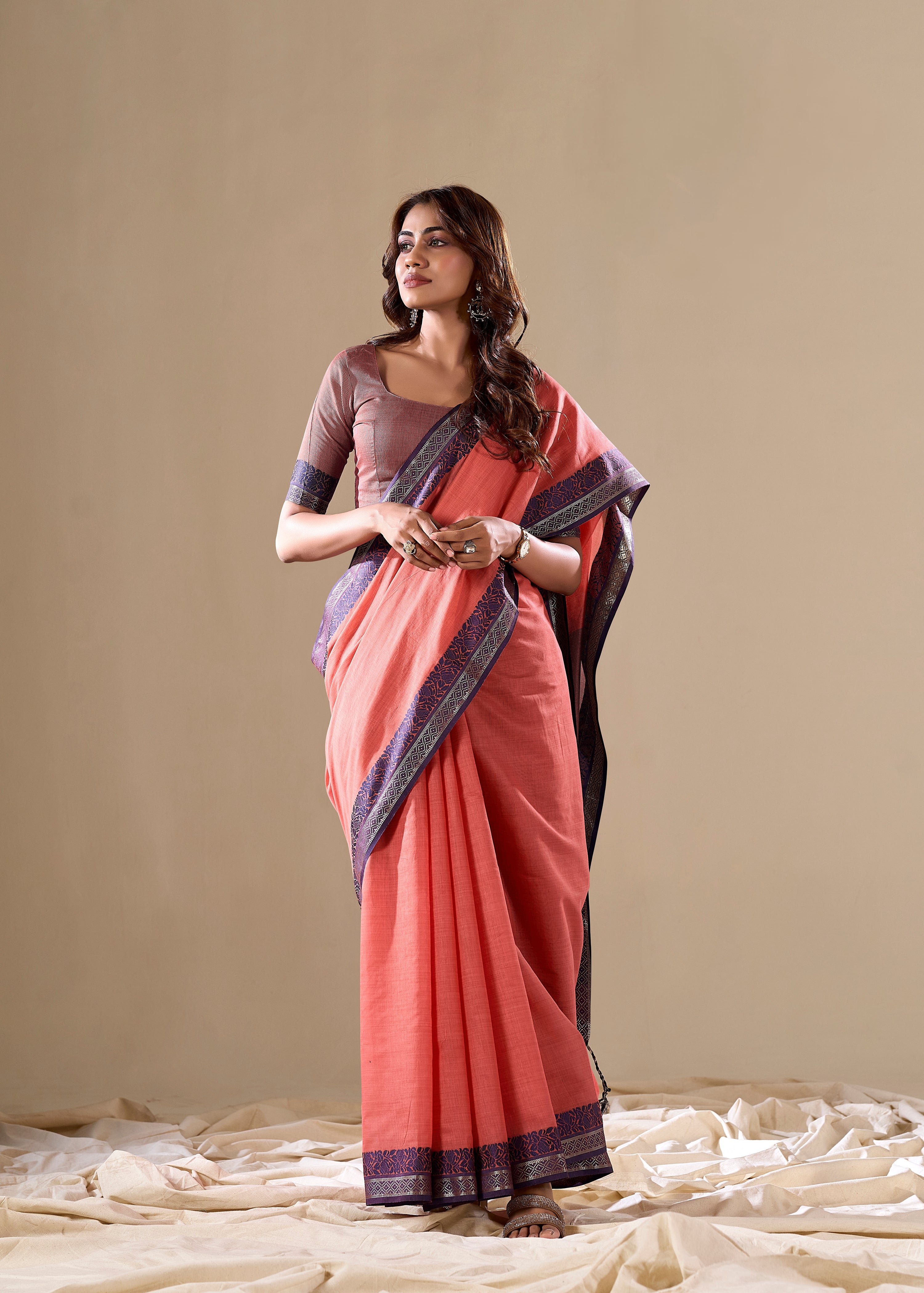 Peach handloom saree with blue pallu