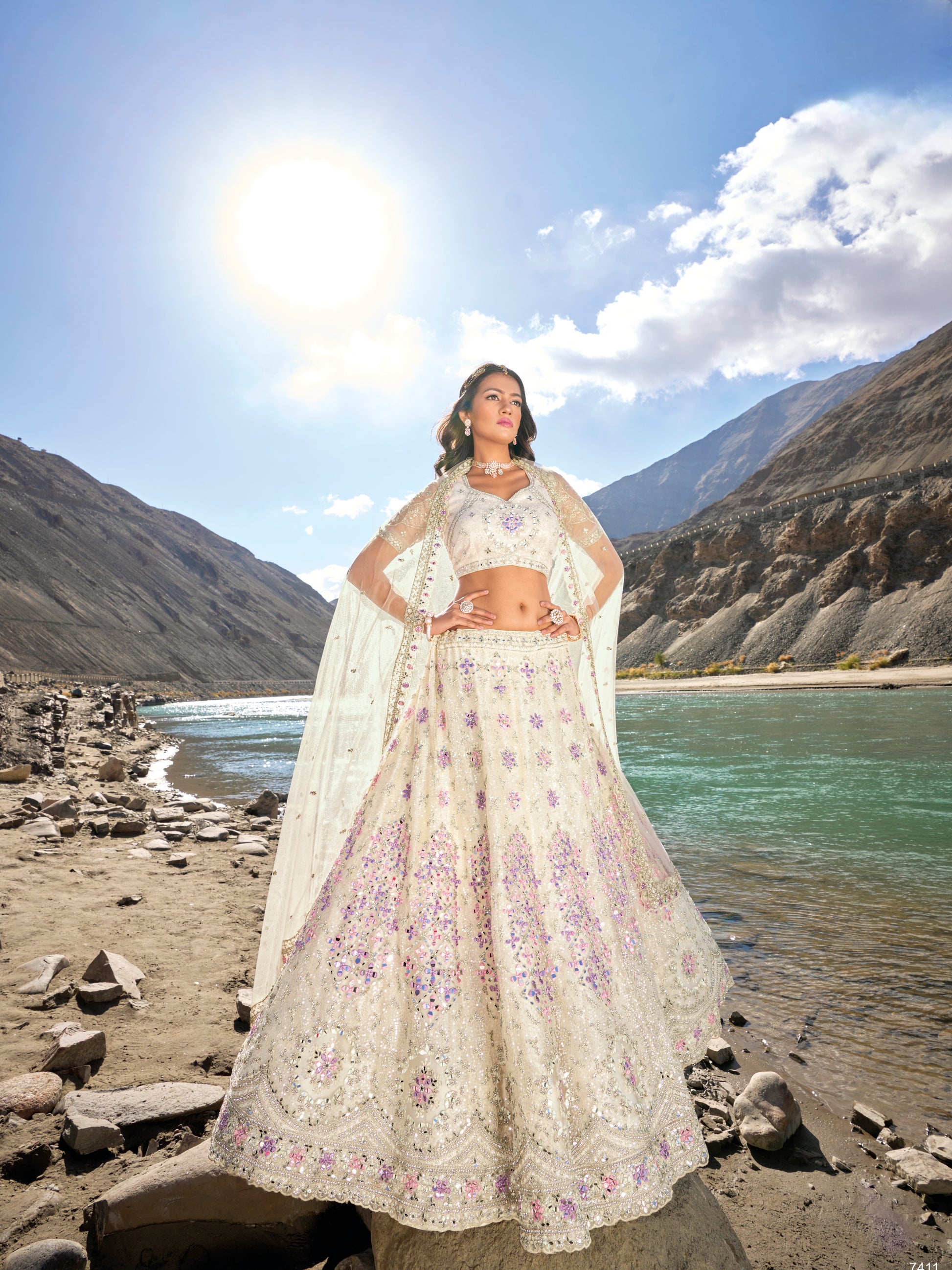Elegant white lehenga choli with mirror and zarkan accents