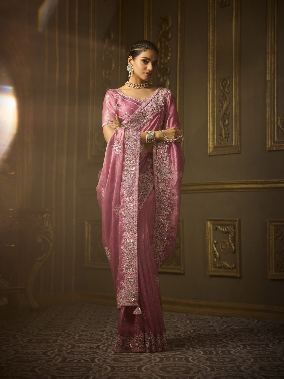 Rose pink bridal saree with golden silk fabric