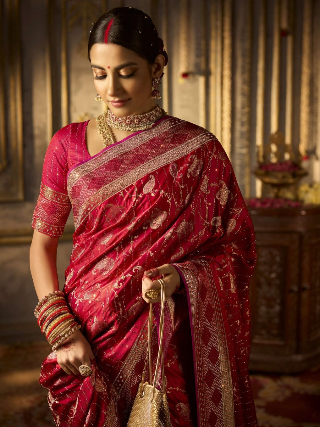 Red bridal satin silk saree with heavy hand embroidery and zircon