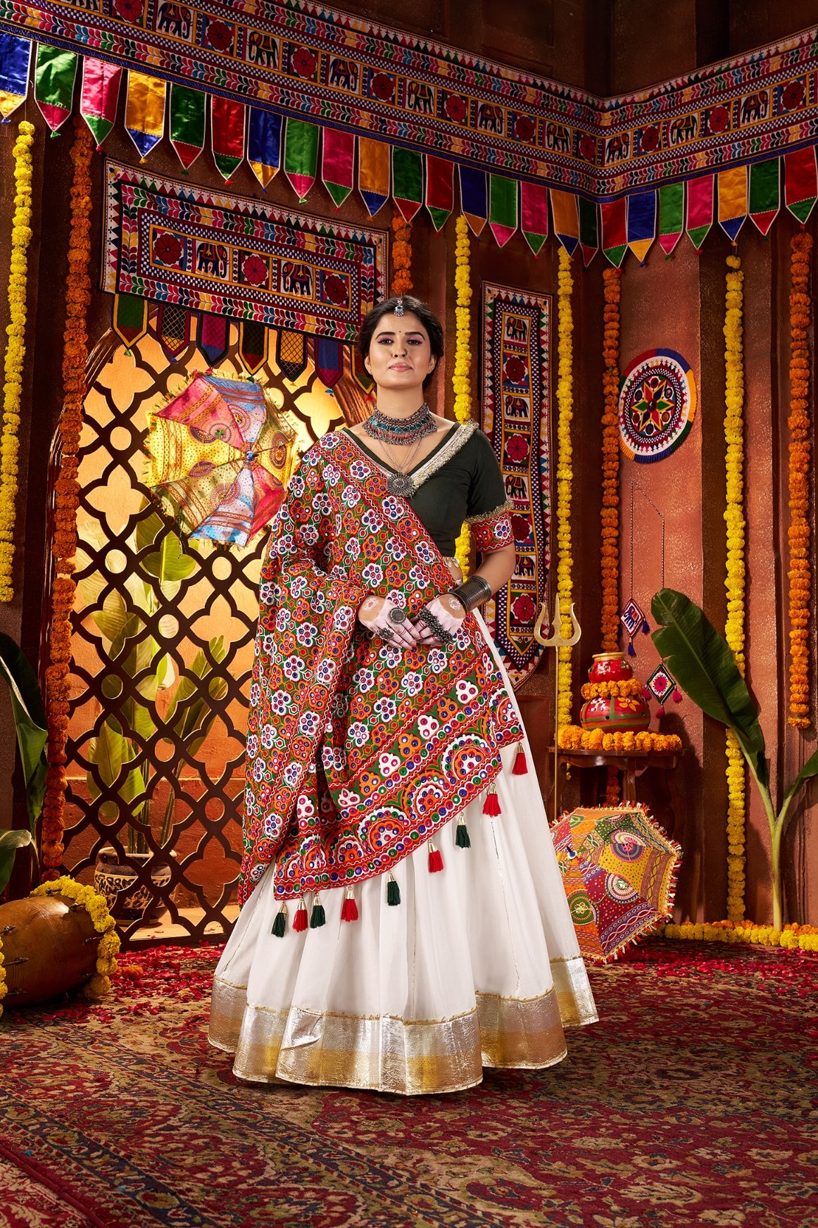 White silk chaniya choli with red mirror dupatta