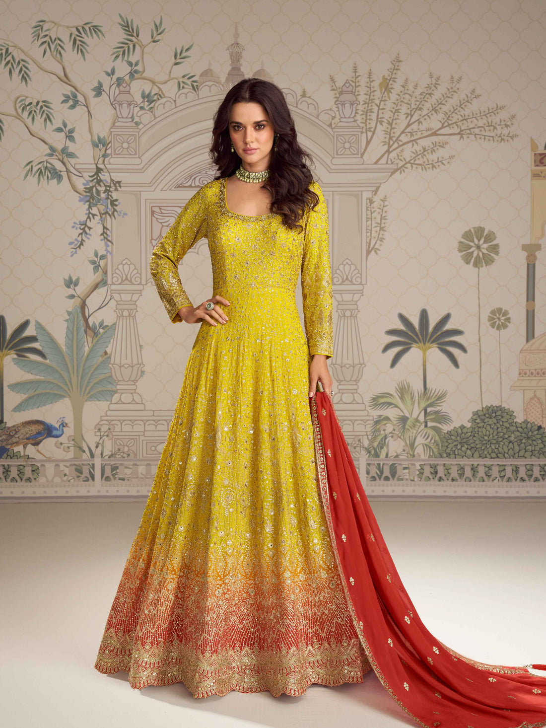 Yellow Anarkali gown with red embroidered dupatta
