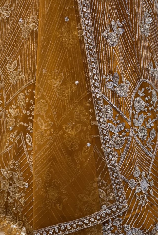 Yellow Pure Heavy Net Motif Handwork Zari Sequins Work Bridal Lehenga Choli