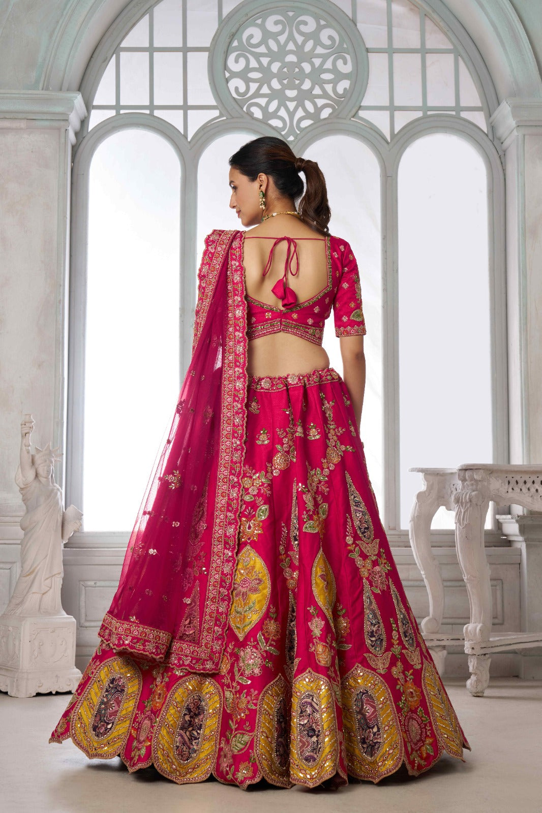 Rani Pink Bridal Lehenga Choli with Multicolor Royal Embroidery
