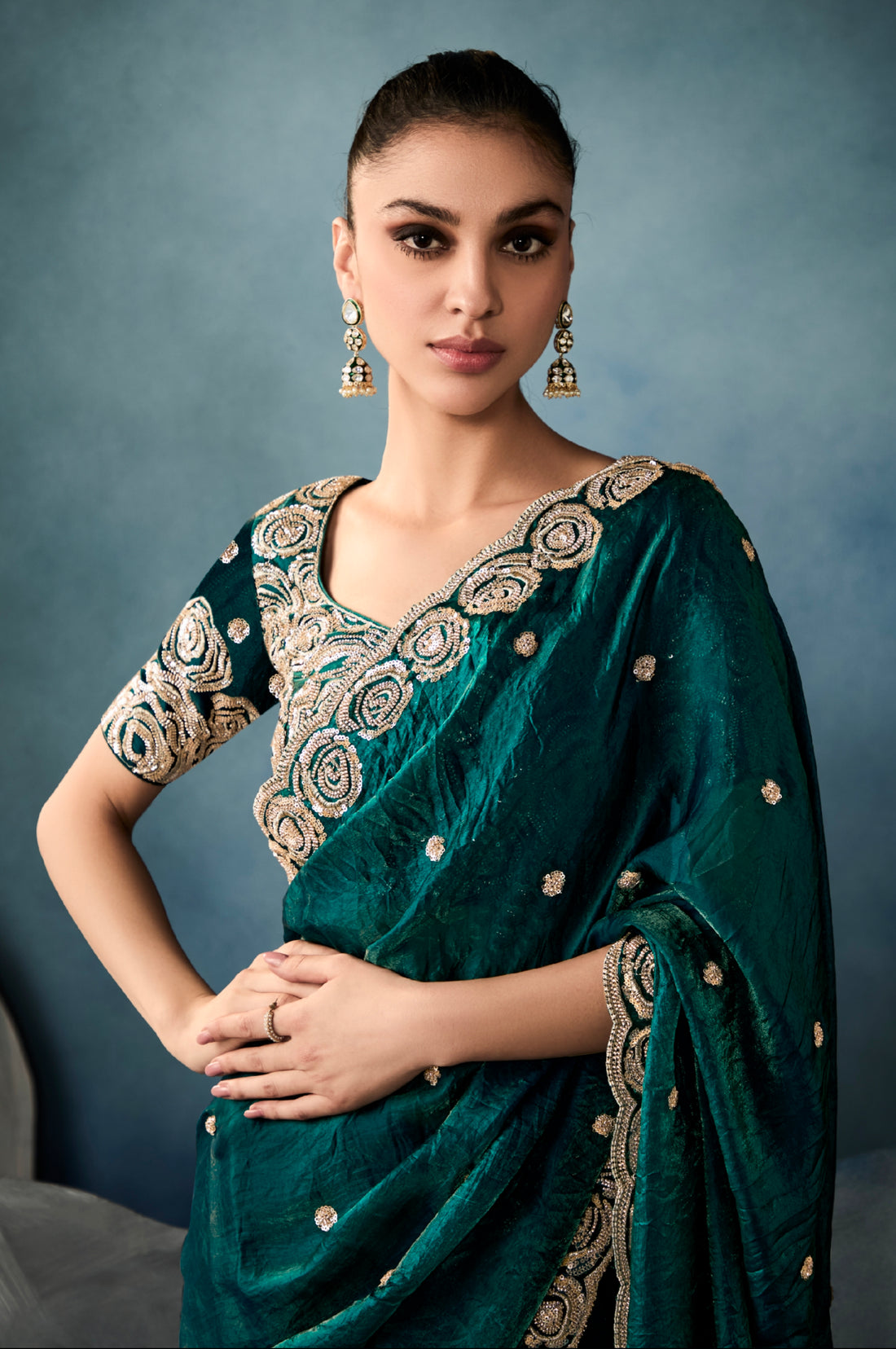 Bottle green tissue saree with hand embroidery