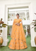 Mustard yellow bridal silk lehenga choli with mirror embroidery