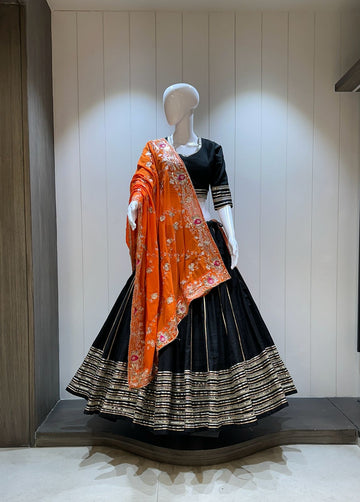 Black chaniya choli with orange dupatta