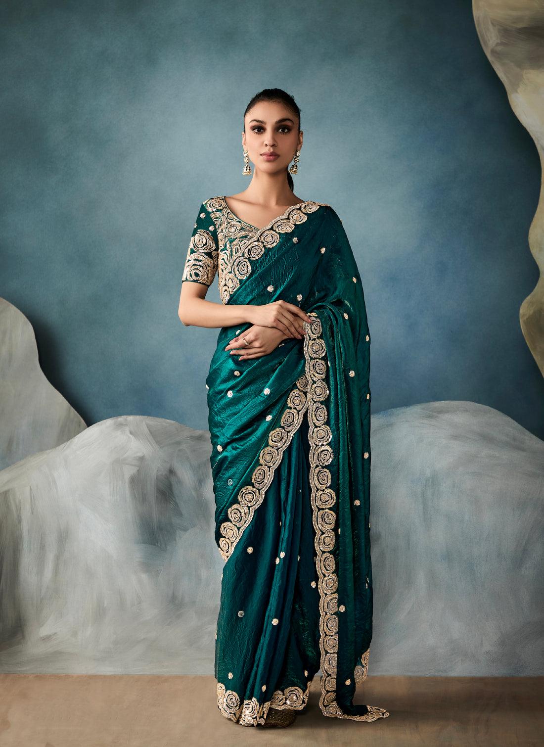 Bottle green tissue saree with hand embroidery
