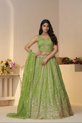 Green Jimmy Choo bridal lehenga with heavy embroidery
