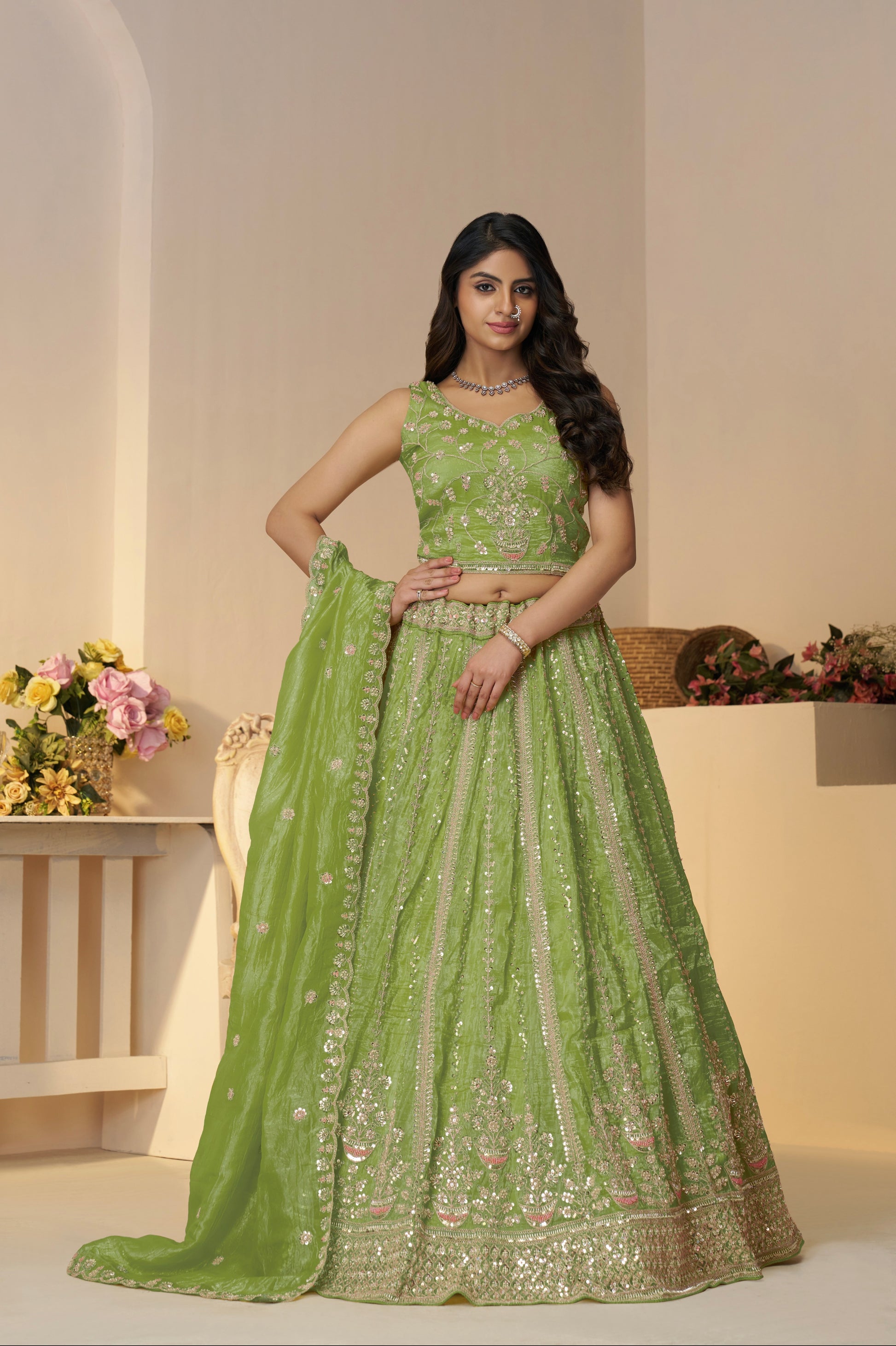 Green Jimmy Choo bridal lehenga with heavy embroidery