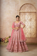 Pink silk bridal lehenga with embroidery and dupatta