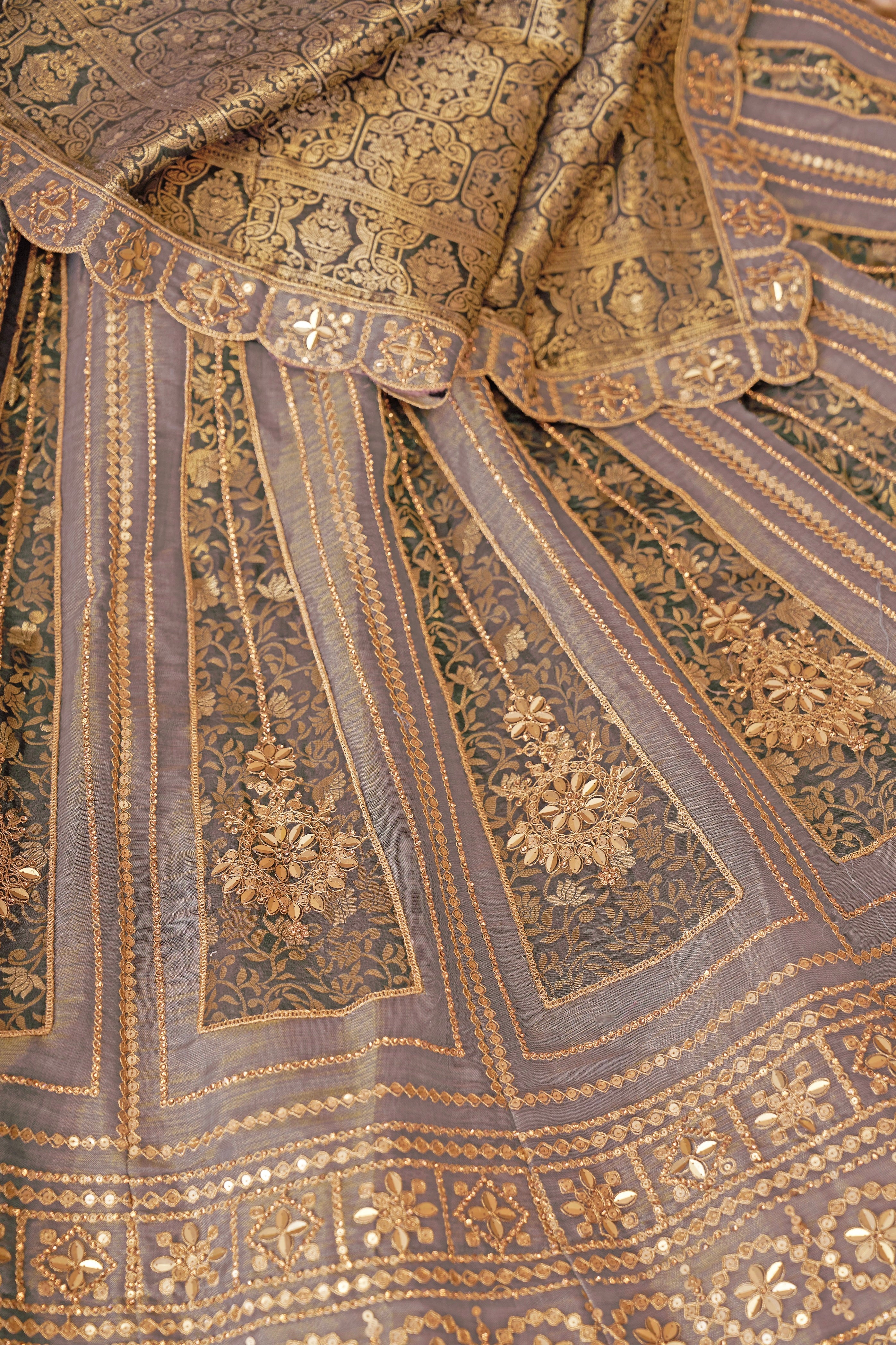 Close-up of zari work on onion tissue wedding lehenga
