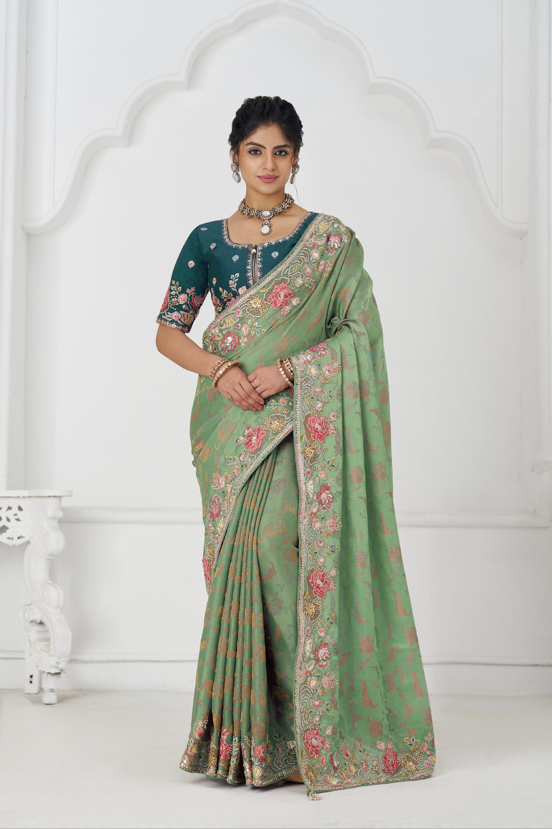 Green Dola silk saree with sequin and bead embroidery